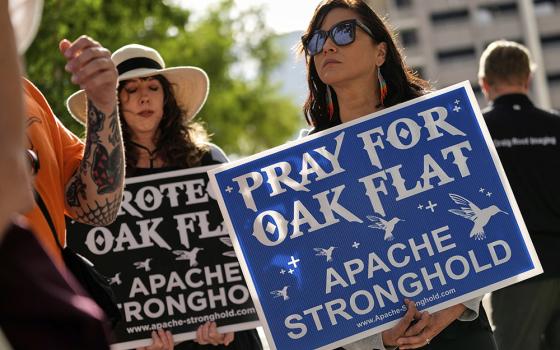 Apaches and others who want to halt a massive copper mining project on federal land in Arizona gather outside the U.S. District Court, May 7, 2025, in Phoenix. (AP/Matt York, File)