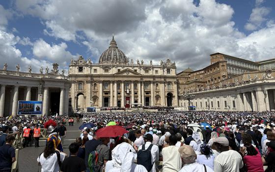A view from St. Peter's Square of the crowd of pilgrims gathered at the Vatican during the installation Mass of Pope Leo XIV on May 18. (NCR photo/Camillo Barone)