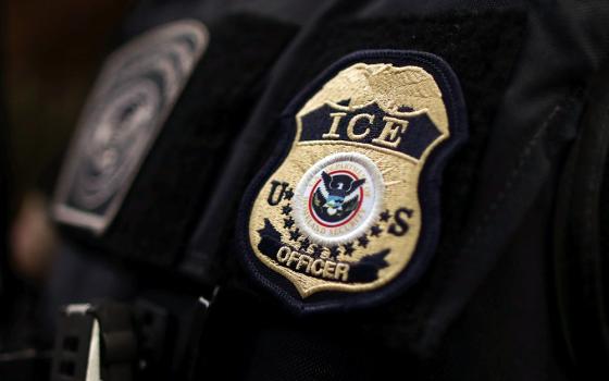The badge of a U.S. Immigration and Customs Enforcement official is seen in this illustration photo. (OSV News/Reuters/Lucy Nicholson)