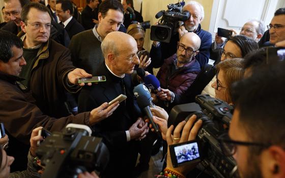 Spanish Msgr. Fernando Ocariz, head of Opus Dei, answers questions during a media opportunity at the University of the Holy Cross in Rome on Jan. 24, 2017. (CNS/Paul Haring)