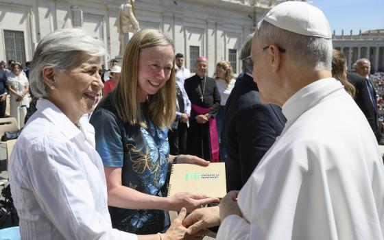 Pope Leo XIV greets María Lía Zervino, a member of the council of the Laudato Si' Movement, and Lorna Gold, executive director, after his weekly general audience in St. Peter's Square at The Vatican May 28, 2025. (OSV News photo/Simone Risoluti, Vatican Media/Catholic Press Photo)