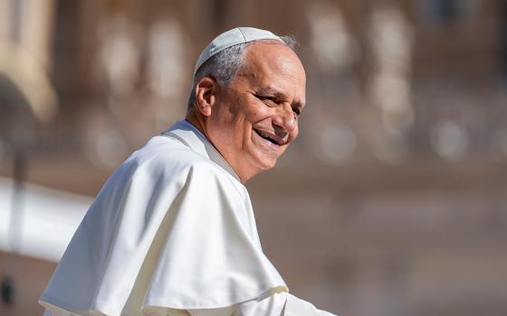 Pope Leo XIV greets visitors and pilgrims from the popemobile as he rides around St. Peter's Square at the Vatican before his weekly general audience June 25, 2025. (CNS/Lola Gomez)