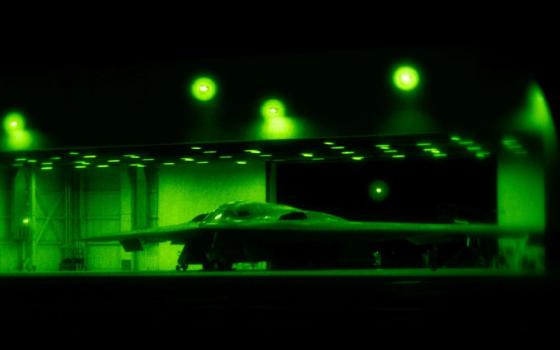 A U.S. Air Force B-2 Spirit stealth bomber is prepared for operations before Operation Midnight Hammer, the U.S. attack on Iran's nuclear facilities, at Whiteman Air Force Base, Mo., June 2025, in a photograph taken using night vision optics. (OSV/U.S. Air Force/Handout via Reuters)