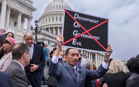 Rep. Kweisi Mfume, Democrat of Maryland, protests against DOGE, the Department of Government Efficiency, as he and other House Democrats speak out against the Republican budget plan, on the House steps at the Capitol in Washington, Feb. 25, 2025. (AP/J. Scott Applewhite)