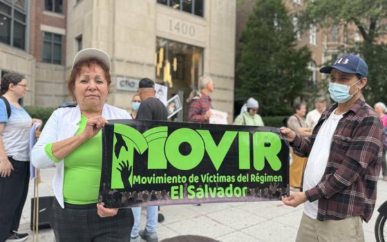 Consuelo Gómez, left, a Catholic Salvadoran mother of two sons captured during a crackdown in El Salvador, protests outside the Salvadoran embassy in Washington, D.C., May 30, 2025. Gómez said she welcomed news of Salvadoran bishops' pastoral letter saying the country's prisons shouldn't be used to advance another country's anti-immigrant agenda. (NCR photo/Rhina Guidos)