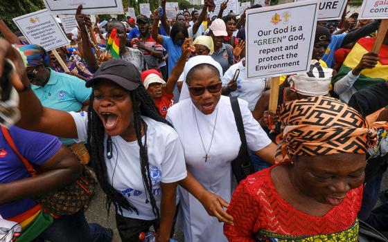 Members of the Accra Archdiocese in Ghana Oct. 11, 2024, demonstrate against illegal mining. In a first-ever joint appeal released July 1, 2025, Catholic bishops in Latin America, Africa and Asia called for an end to fossil fuels and decried the exploitation of natural resources, ecosystems and people. (OSV News/Reuters/Francis Kokoroko)