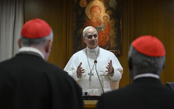 Pope Leo XIV speaks with the College of Cardinals in the New Synod Hall at the Vatican May 10, 2025, during his first formal address to the college since his election May 8. Leo spoke to the cardinals about choosing the name Leo XIV. (CNS/Vatican Media)
