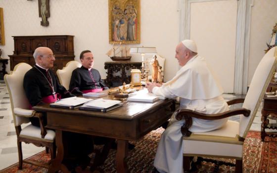Pope Francis meets Msgr. Fernando Ocáriz and Msgr. Mariano Fazio in 2021.
