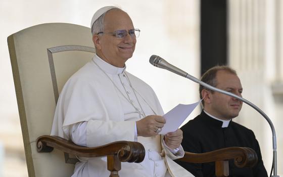 Pope Leo XIV smiles as he greets pilgrims and visitors at his general audience Aug. 6, 2025, in St. Peter's Square at the Vatican. (CNS/Vatican Media)