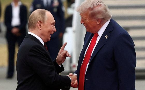 U.S. President Donald Trump and Russian President Vladimir Putin talk Aug. 15, 2025, after they arrived at Joint Base Elmendorf-Richardson in Anchorage, Alaska, for talks about bringing an end to the war in Ukraine. (OSV News/Reuters/Kevin Lamarque)