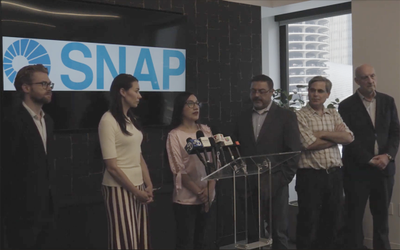At a July 31 SNAP press conference in Chicago, Ana María Quispe Díaz, center, repeated allegations that Pope Leo XIV, as a bishop in Peru, failed to investigate allegations of abuse she and two sisters reported to him against two priests in his diocese. (NCR screenshot/YouTube)