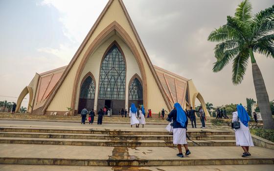Women religious are pictured in a file photo entering a church in Abuja, Nigeria. (OSV News/Reuters/Afolabi Sotunde)