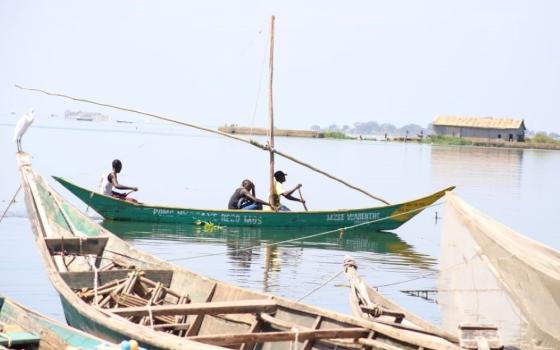 Fishermen work on Lake Victoria.