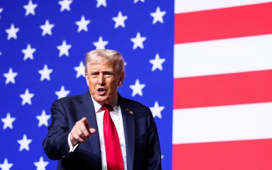 U.S. President Donald Trump gestures after speaking during a meeting of senior military leaders convened by U.S. Defense Secretary Pete Hegseth, at Marine Corps Base Quantico in Virginia Sept. 30, 2025. In an unprecedented gathering, almost 800 generals, admirals and their senior enlisted leaders were ordered into one location from around the world on short notice. (OSV News/Reuters/Kevin Lamarque)