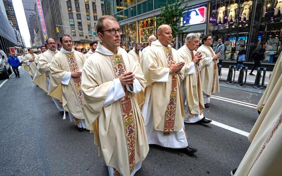 Priests participate in the fifth annual Napa Institute-sponsored Eucharistic procession through the Midtown Manhattan section of New York City Oct. 14, 2025. (OSV News/Gregory A. Shemitz)