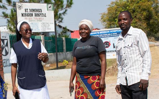 From left: Sr. Maureen Mofu, and Roiness and Aaron Chimfwembe at St. Dominic's Mission Hospital in Ndola, Zambia. The Chimfwembes participate in the SMART Couples Methodology program, facilitated by the Dominican Sisters of the Sacred Heart under the Ndola Diocese. (GSR photo/Derrick Silimina)