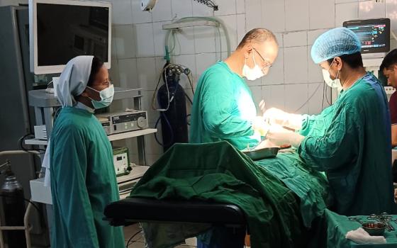 Sr. Lilly Thomas of the Sisters of Charity of Jesus and Mary assists in a surgery at St. Joseph Community Hospital in the Jammu-Srinagar Diocese, India. (Umar Manzoor Shah)