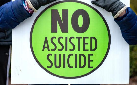 Sign that reads: "No assisted suicide"