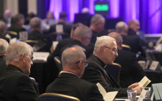 Bishops pray during a Nov. 12, 2025, session of the fall general assembly of the U.S. Conference of Catholic Bishops in Baltimore.