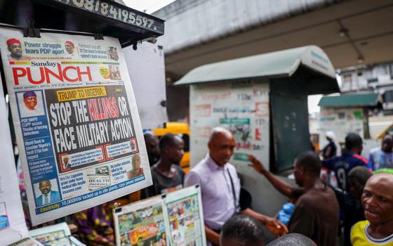 A newspaper with an article reporting U.S. President Donald Trump's message to Nigeria over the treatment of Christians hangs at a newspaper stand in Ojuelegba, Lagos, Nigeria. Nov. 2, 2025. (OSV News/Reuters/Sodiq Adelakun)