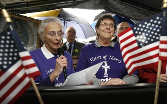 Mercy Srs. Pat Murphy, left, and JoAnn Persch at the ICE facility in Broadview, Illinois, outside Chicago, in 2009 (Courtesy of Chicago Catholic)