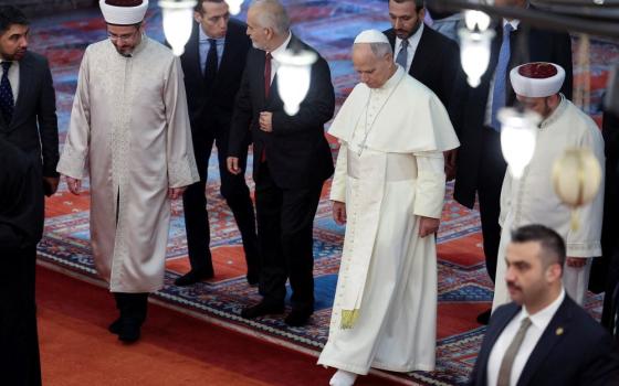 Pope Leo XIV visits the Sultanahmet Mosque, known as the Blue Mosque, during his first apostolic journey, in Istanbul, Turkey, Nov. 29. (OSV News/Reuters/Umit Bektas)