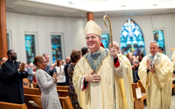Bishop Mark O'Connell smiles following his installation Mass as the 11th bishop of Albany, N.Y., at St. Edward the Confessor Church in Clifton Park Dec. 5. 