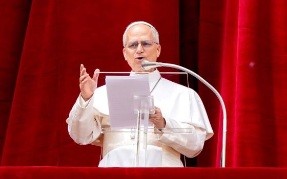 Pope Leo XIV leads the midday Regina Coeli prayer for the first time from the central balcony of St. Peter's Basilica in the Vatican on May 11, four days after being elected pope. 