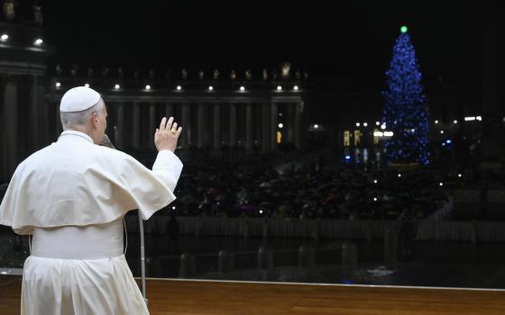 Pope Leo XIV greets an estimated 5,000 people who could not get in to St. Peter's Basilica at the Vatican for the Christmas Mass at Night Dec. 24, 2025. (CNS photo/Vatican Media)