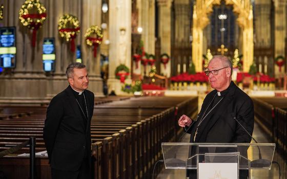 New York Archbishop Timothy Dolan, right, greets Bishop Ronald Hicks during a news conference at St. Patrick's Cathedral in New York City Dec.18, 2025. Hicks will be installed as the new archbishop of the New York Archdiocese in early February. (AP/Ryan Murphy)