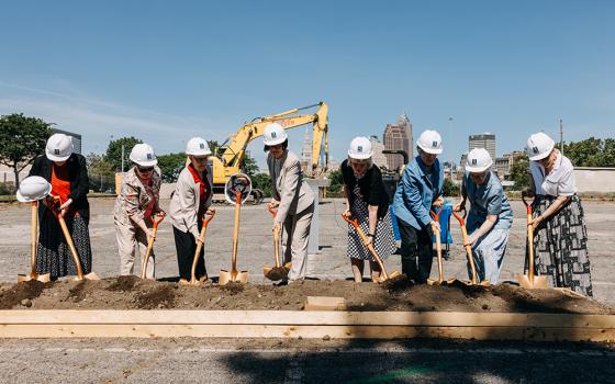 Women Religious Archives Collaborative leaders and sisters from member congregations ceremonially break ground July 22, 2025, on the nonprofit’s project to build a center to house the archives for up to 75 congregations of Catholic sisters. (Courtesy of Women Religious Archives Collaborative)