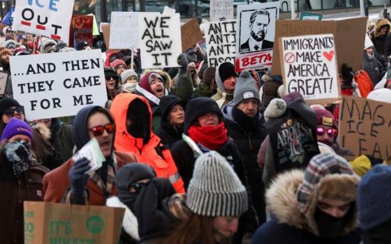 People take part in a demonstration in Minneapolis Jan. 25, a day federal agents shot and killed Alex Pretti, a 37-year-old intensive care unit nurse who was filming at a protest against the immigration crackdown in Minneapolis. (OSV News/Reuters/Shannon Stapleton)