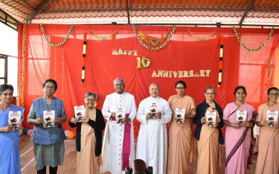 Bambina Sr. Adele Korah, third from left, stands with Auxiliary Bishop Joseph Susainathan of Bangalore and Fr. Francis Kodiyan, Prison Ministry India national coordinator, and nun volunteers, for the release of Korah's book My Journey with Brethren Behind Bars. (Courtesy of Sr. Adele Korah)
