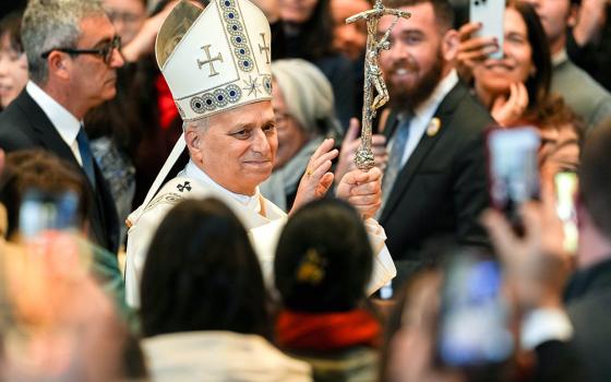 Pope Leo XIV blesses the faithful after celebrating Mass on the feast of Mary, Mother of God, and World Peace Day in St. Peter’s Basilica at the Vatican Jan. 1, 2026. (CNS/Lola Gomez)