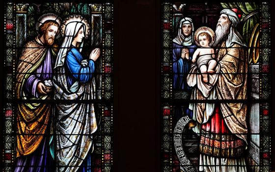 The presentation of Jesus in the Temple 40 days after his birth is depicted in stained-glass windows at Our Holy Redeemer Church in Freeport, N.Y. The feast of the Presentation of the Lord, also known as Candlemas, is celebrated Feb. 2. (OSV News/Gregory A. Shemitz)