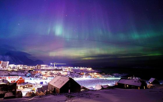 Aurora borealis, also known as the northern lights, is seen in the sky above Nuuk, Greenland, Jan. 20, 2026. (AP/Evgeniy Maloletka)