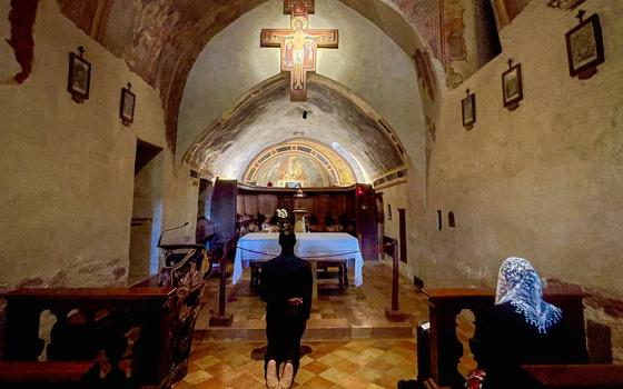 The interior of the Church of San Damiano outside of Assisi, Italy. Above the altar today is a replica of the crucifix from which Christ spoke to St. Francis of Assisi, saying: "Francis, go and repair my house, which, as you see, is falling completely to ruin." (Dreamstime/Debra Reschoff Ahearn)