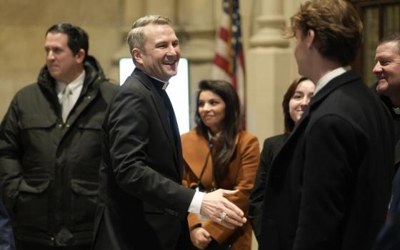 Archbishop-designate Ronald Hicks greets people as he arrives for a news conference at St. Patrick's Cathedral in New York City Feb. 5, a day before he was to be formally installed as the archbishop of the Archdiocese of New York. (OSV News/Gregory A. Shemitz)