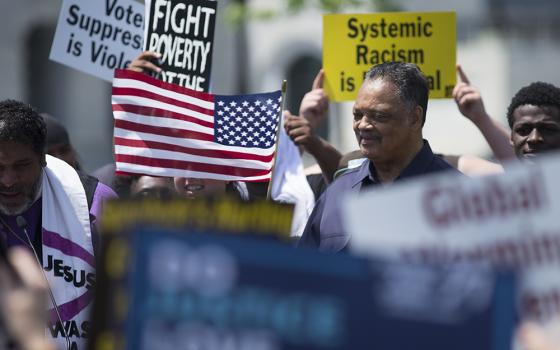 The Rev. Jesse Jackson and a number of religious leaders are seen near Capitol Hill in Washington May 21, 2018, during a protest to demand elected officials take immediate steps to confront systemic racism. Jackson died Feb. 17, 2026. (CNS/Tyler Orsburn)