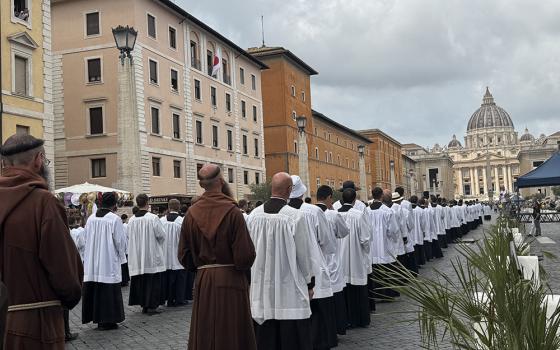 Seminarians and priests walk in procession to the Holy Door of St. Peter's Basilica at the Vatican Aug. 21, 2025. The men were among about 8,000 people who joined a pilgrimage sponsored by the traditionalist Society of St. Pius X, which exists in an "irregular" state of communion with the wider Catholic Church. (CNS/Cindy Wooden)