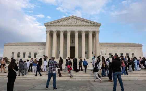 People walk near the U.S. Supreme Court in Washington Feb. 25, 2026. The U.S. Conference of Catholic Bishops is among the organizations that filed amicus briefs Feb. 26, 2026, opposing President Donald Trump's effort to change birthright citizenship. The court is scheduled to hear oral arguments in the case, Trump v. Barbara, April 1. (OSV News/Reuters/Kylie Cooper)