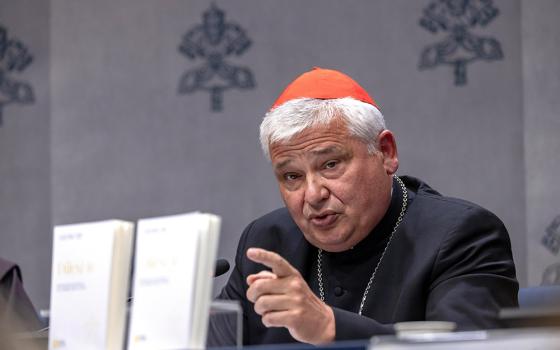 Cardinal Konrad Krajewski, prefect of the Dicastery for the Service of Charity, speaks at a Vatican news conference Oct. 9, 2025. (CNS/Pablo Esparza)