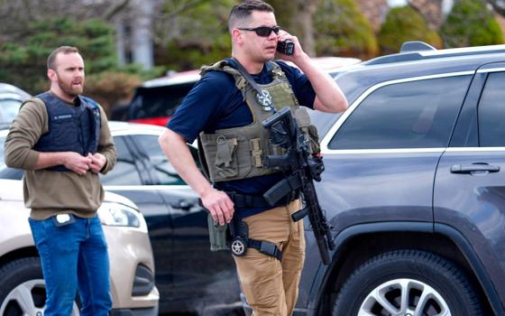 Emergency personnel respond to a reported shooting incident at Temple Israel synagogue in West Bloomfield, Mich., March 12, 2026. An attacker armed with a rifle rammed his vehicle into one of the nation's largest Reform synagogues and was fatally shot by security. Federal investigators said the attack was an act of violence targeting the Jewish community. (OSV News/Dave Boucher, USA Today Network viaReuters)