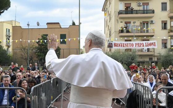 Pope Leo XIV greets the local community during a parish visit to the Church of the Sacred Heart of Jesus in Rome, Italy, March 15, 2026. (CNS/Vatican Media)