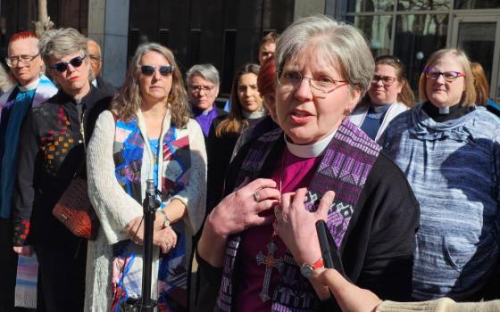 Bishop Jennifer Nagel, of the Minneapolis Synod of the Evangelical Lutheran Church in America, speaks to reporters outside the federal courthouse in St. Paul, Minn., on March 20, 2026, after a federal judge ruled that clergy will be allowed to minister to immigrants in a holding facility at the headquarters of the Trump administration's enforcement surge in Minnesota. (AP/Steve Karnowski)