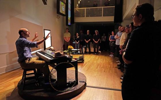 Matthew LaBanca, left, performs "Communion" at The Cell theater in New York. On March 26, his film of the same name had its world premiere at the Church of St. Ignatius Loyola in New York. (Courtesy of Matthew LaBanca)