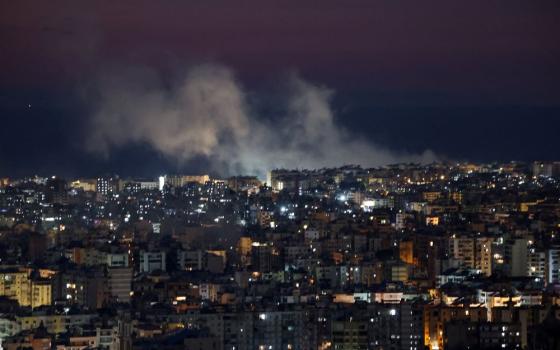 Smoke billows March 3 after an Israeli strike on Beirut's southern suburbs following an escalation between Hezbollah and Israel amid the U.S.-Israeli conflict with Iran. (OSV News/Reuters//Mohamed Azakir)
