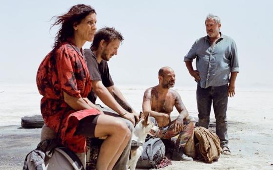 Stefania Gadda, Joshua Liam Herderson, Richard 'Bigui' Bellamy and Sergi López appear in a scene in the Oscar-nominated film "Sirāt." López plays a father who goes to search for his missing daughter at a rave in the Moroccan desert. (Madman Entertainment)