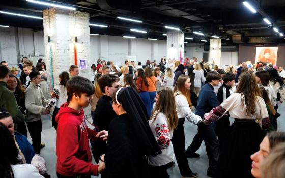 Ukrainian youth participate on Feb. 8 in a national dance during a vechornytsi social gathering in Zaporizhzhia, Ukraine. (Courtesy of Anhelina Yaroshenko) 