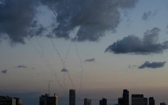 Traces of an air defense missile interception is seen over Tel Aviv, Israel, Saturday, Feb. 28, 2026. (AP photo/Ohad Zwigenberg)